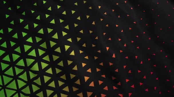 Czarne tło.Motion.Jasnozielone i czerwone trójkąty różnej wielkości, które są tworzone w animacji i oscylują na czarnym płótnie. — Wideo stockowe