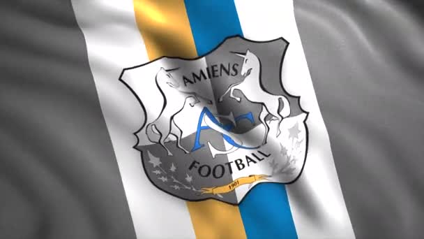 Närbild av en abstrakt färgglad viftande flagga Amiens SC. Rörelse. Franska föreningen fotbollsklubb flagga med emblem. Endast för redaktionellt bruk. — Stockvideo