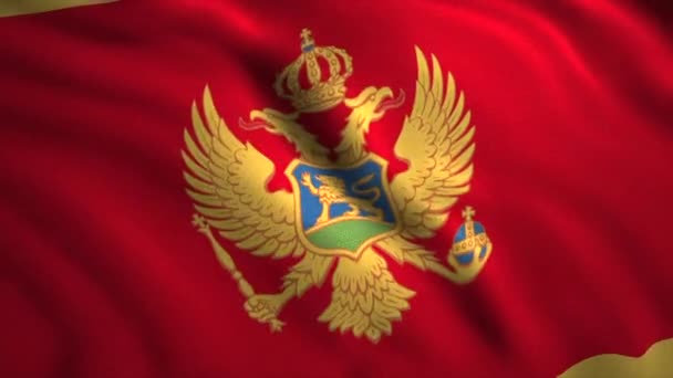 Bandera de Montenegro ondeando con águila de doble cabeza. Moción. Ripear la bandera colorida de un país. — Vídeo de stock