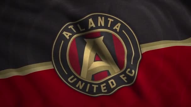 Atlanta United FC American profesjonalny klub piłkarski, który rywalizuje w Major League Soccer. - Wniosek. Abstrakcyjny logotyp na machającej fladze. Wyłącznie do użytku redakcyjnego. — Wideo stockowe