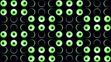 Siyah arka plan. Tasarım. Canlandırmada farklı renklerde parlayan yeşil ve mavi ampullü parlak bir arka plan. Yüksek kalite 4k görüntü