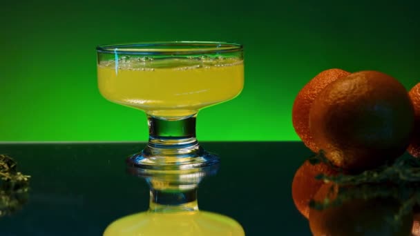 Close Orange Citrus Sparkling Beverage Cocktail Glass Slow Motion Stock — Stock Video