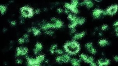 Coronavirus geçmişi. Hareket. Yeşil covid 19 hücre yayılıyor ve siyah bir zemin üzerinde yüzüyor, salgın konsepti 