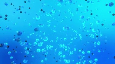 Mavi vakumdaki yuvarlak şekilli parçacıklar. Hareket. Su altında küçük küreler ya da kabarcıklar