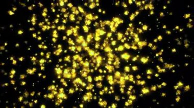 Siyah bir zemin üzerinde parlak renkli cam parçacıkları uçuşuyor. Hareket. Güzel yansıtıcı küçük noktalar