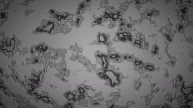 Kimyasal reaksiyonla soyut monokrom arkaplanı. Hareket. Karışık çözümler yayılan lekeler yaratır