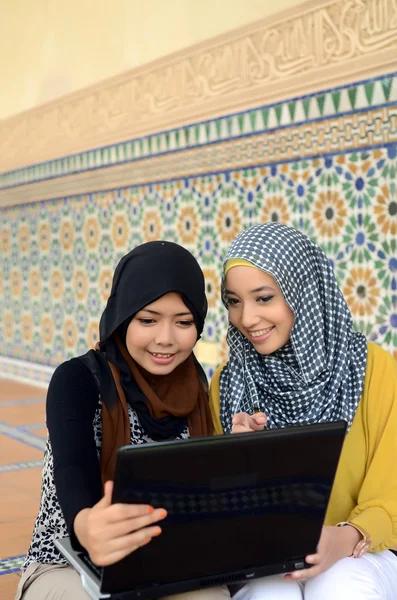 Close-up portrait of beautiful young Asian girl in head scarf — Stock Photo, Image