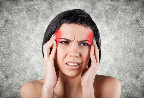 Girl with a painful head — Stock Photo, Image