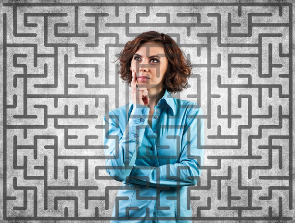 Girl before a labyrinth