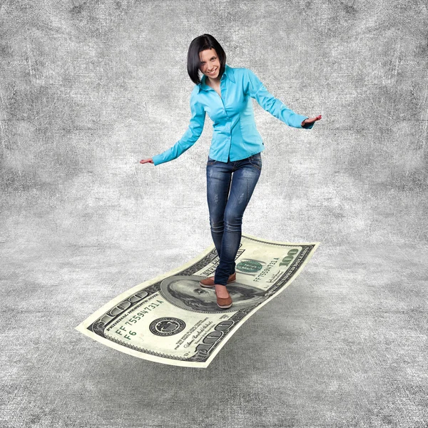 Girl on a money — Stock Photo, Image