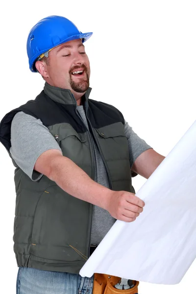 Builder skrattar åt planer — Stockfoto