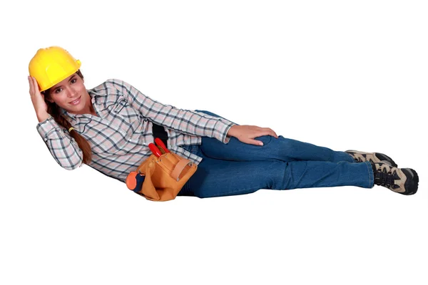 Full-length portrait of female craftswoman with tilted head — Stock Photo, Image