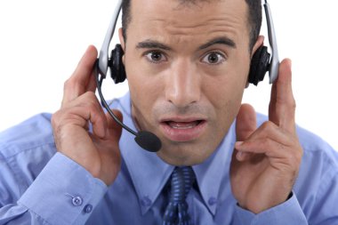 Call centre operator looking shocked clipart