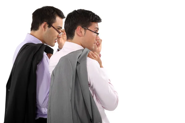 Duo of young businessmen with glasses lowered — Stock Photo, Image