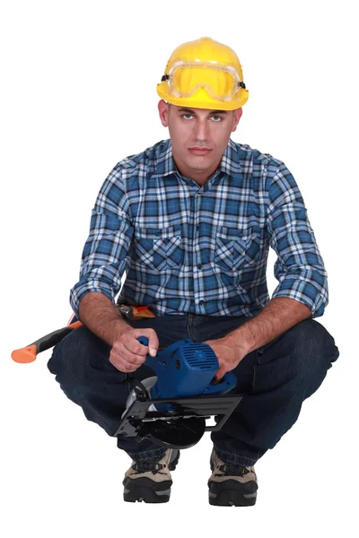 Worker with circular saw — Stock Photo, Image