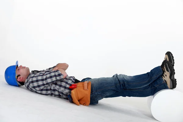 Laborer laid on the floor — Stock Photo, Image