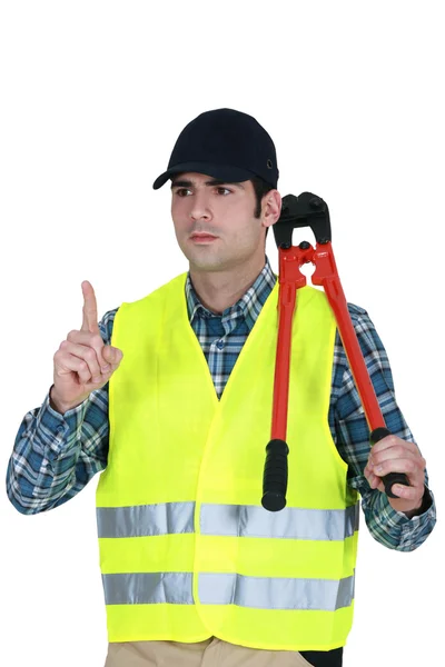 Worker with a pair of bolt cutters — Stock Photo, Image