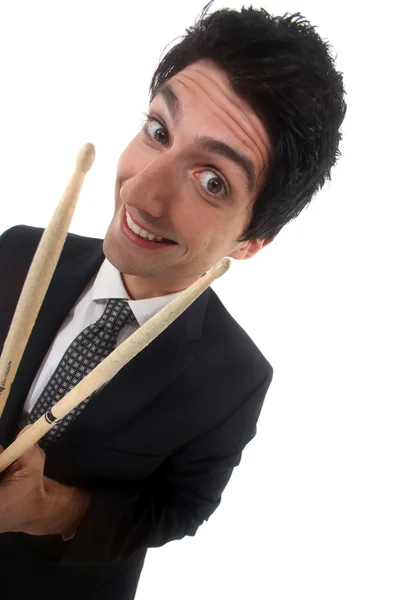 Man in a suit with drum sticks — Stock Photo, Image