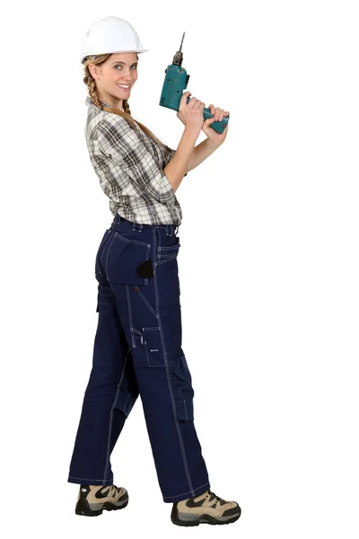 Tradeswoman con cacciavite elettrico — Foto Stock