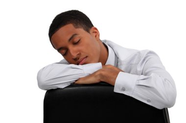 Young man sleeping on the job clipart