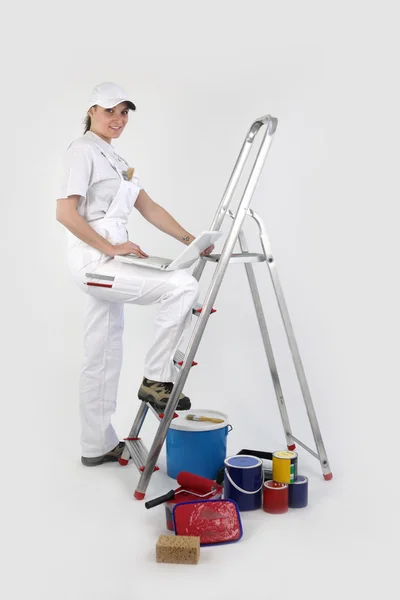 Female painter on a ladder — Stock Photo, Image