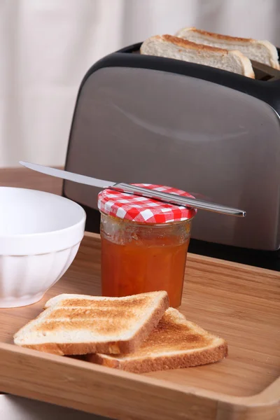 Toaster with jam and toasted bread — Stock Photo, Image