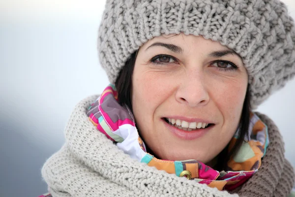 Brunette wearing hat and scarf — Stock Photo, Image