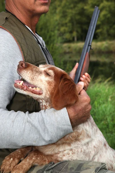 Jäger mit seinem Hund — Stockfoto