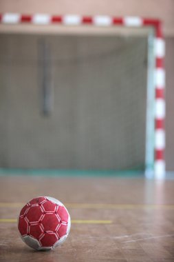 Ball in front of indoor goal clipart