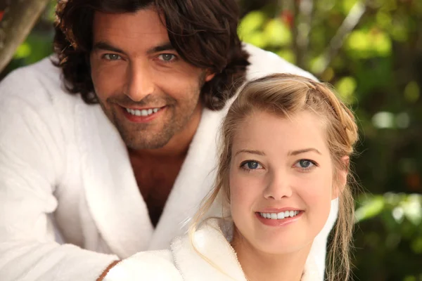 Couple in dressing gowns — Stock Photo, Image