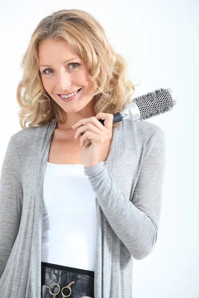 Mujer con cepillo de pelo — Foto de Stock