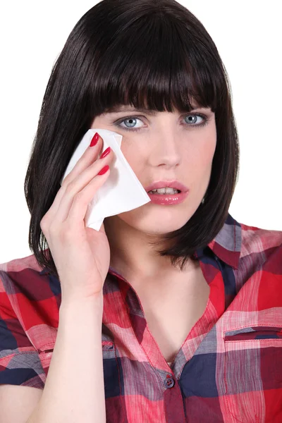 Mujer limpiando una lágrima —  Fotos de Stock