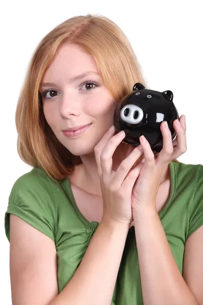 Young woman with money box — Stock Photo, Image