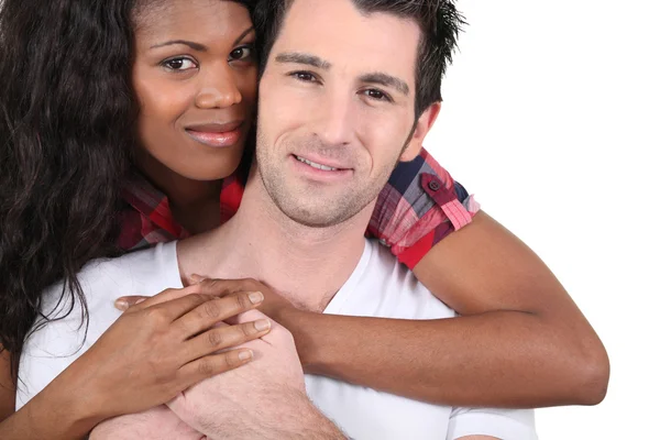 Afro woman and white man hugging — Stock Photo, Image