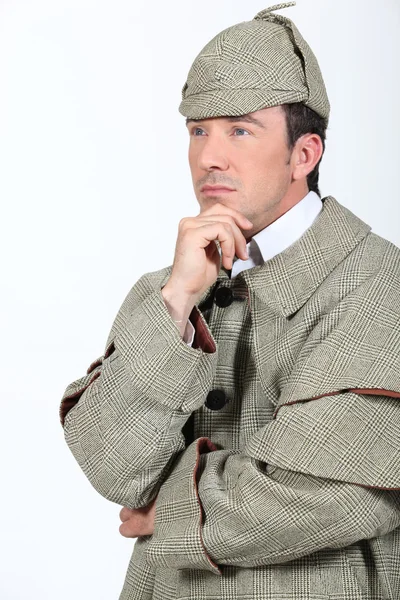Hombre en traje de Sherlock Holmes — Foto de Stock