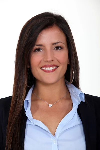 Portrait of brunet businesswoman all smiles against white background — Stock Photo, Image