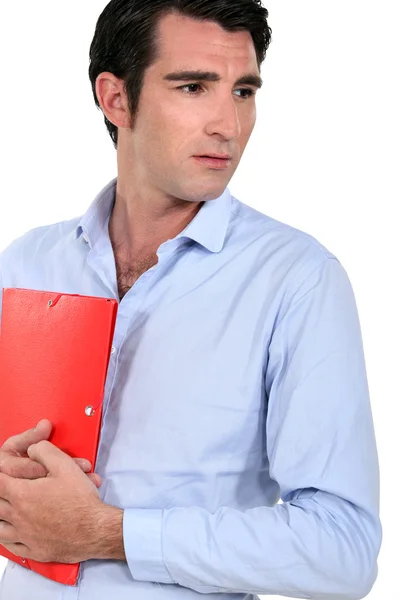 A businessman holding a file. — Stock Photo, Image