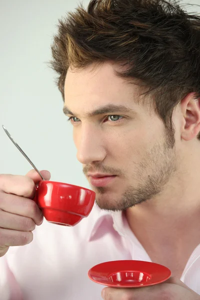 Man with red coffee cup — Stock Photo, Image