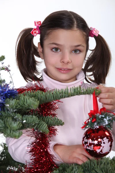 Маленька дівчинка святкує Різдво — стокове фото