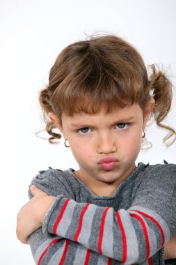 Angry little girl grinning clipart
