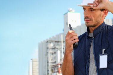 Foreman with a walkie talkie clipart