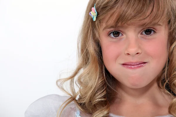 Portrait of a girl with her mouth full — Stock Photo, Image