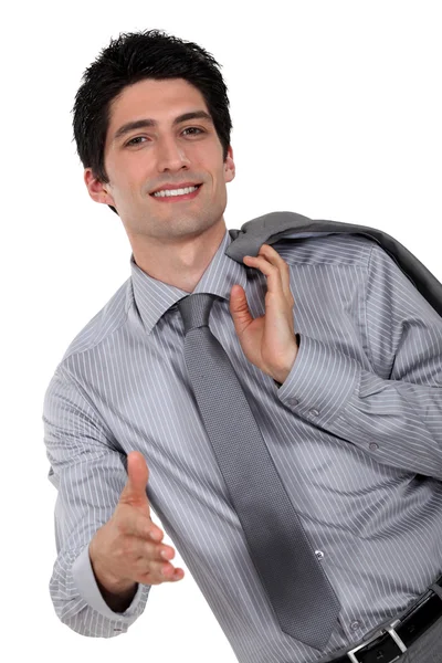 Confident businessman offering to shake hand — Stock Photo, Image