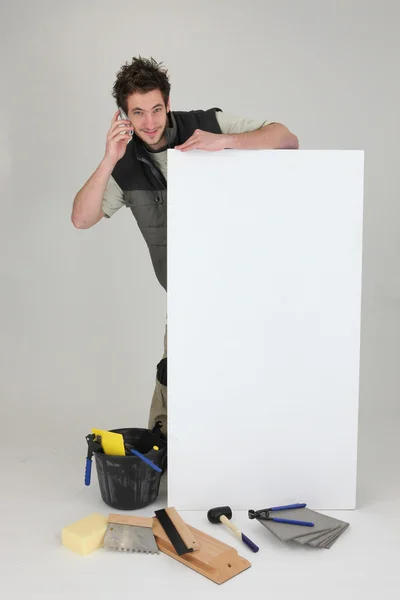 Handyman on tiling job — Stock Photo, Image