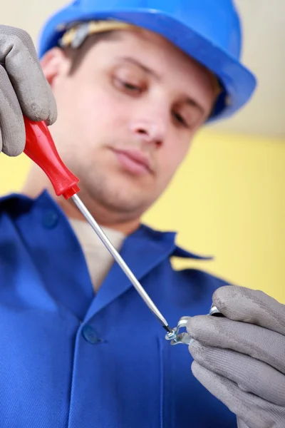 Plumber screwing a fitting — Stock Photo, Image