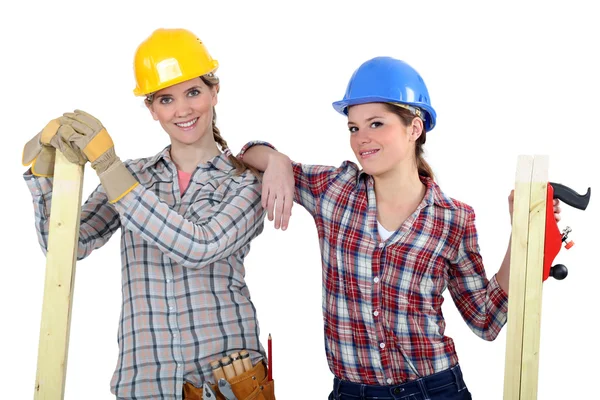 Female builders with timber — Stock Photo, Image