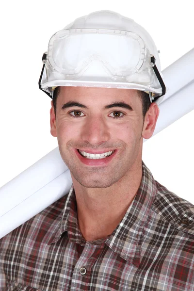 Close-up shot of a grinning tradesman — Stock Photo, Image