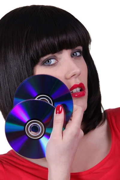 Sexy chica con CD sobre fondo blanco —  Fotos de Stock