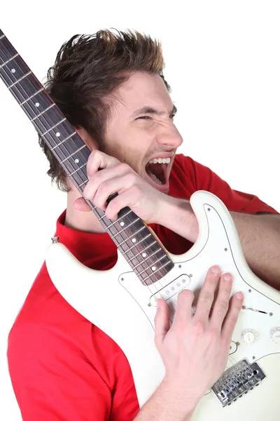 Man enthusiastically playing his guitar — Stock Photo, Image