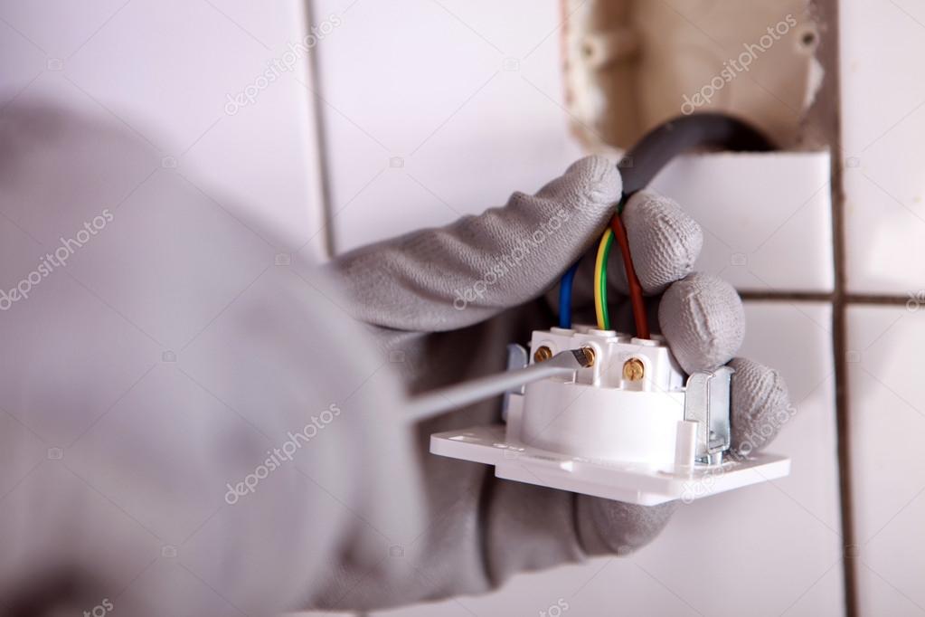 Electrician checking wiring — Stock Photo © photography33 14561517